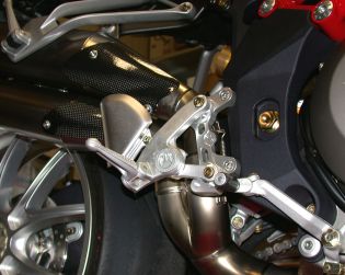 Machined from solid rearsets adaptor adjustment plates